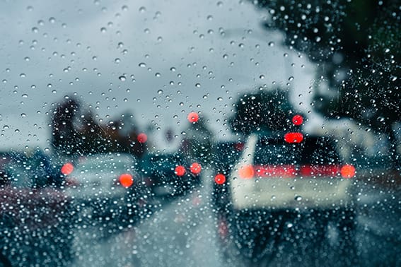 heavy traffic during a rainy day raindrops